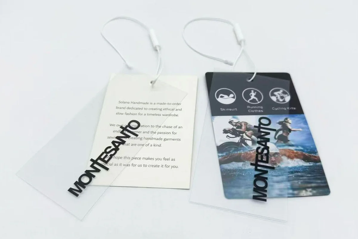 Printed hanging tag samples showing two artwork layouts.