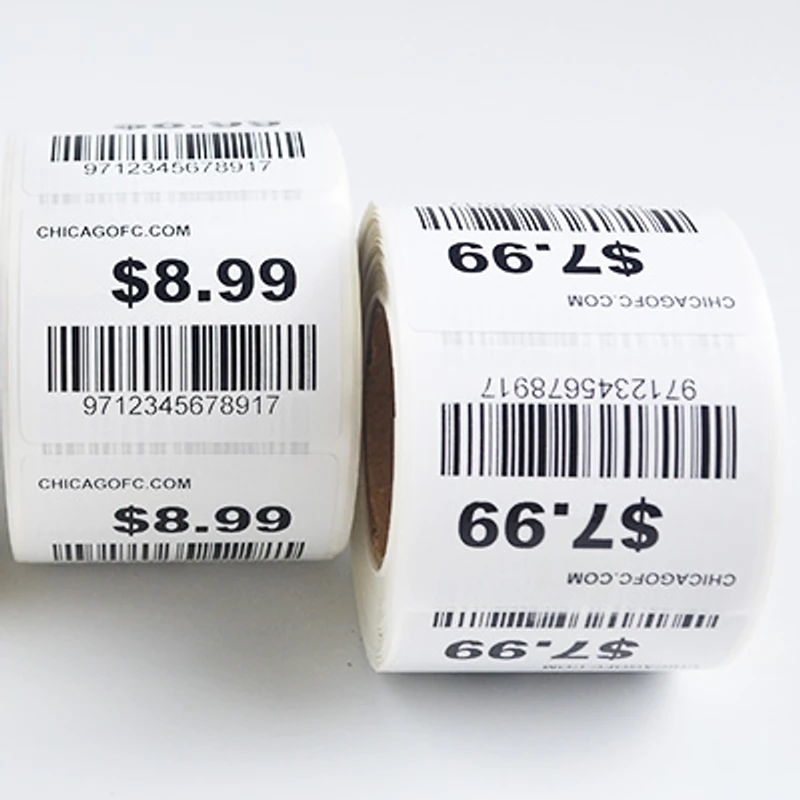 Two finished barcode-label rolls printed with different prices.