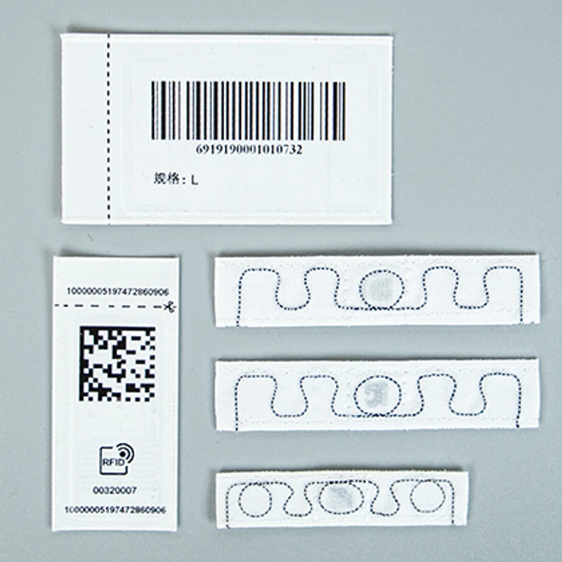 Linear barcode, QR code and RFID antenna label samples.
