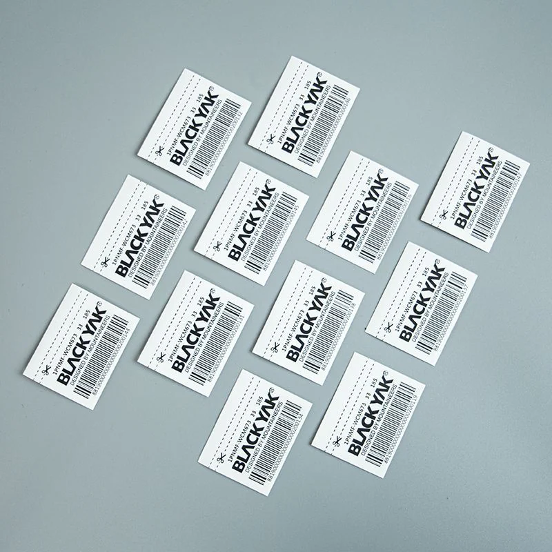 White brand-label samples printed with linear barcodes.