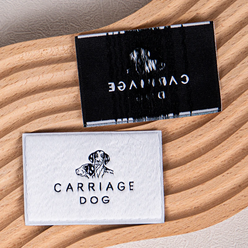 The front and reverse sides of a woven brand label.