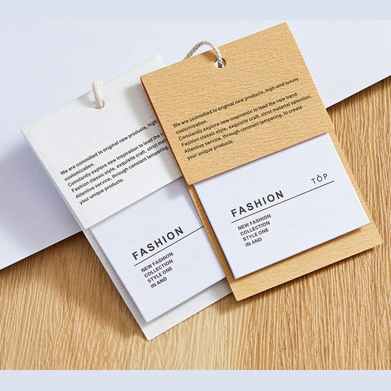 Layered tag sets combining kraft-colored and white cards.