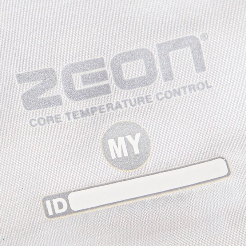 A light gray transfer logo on white fabric.