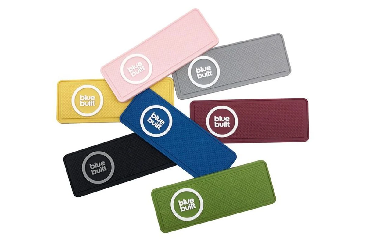 Rectangular molded label samples in pink, gray, yellow, blue, red and green.