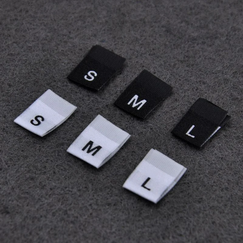 Folded letter-size labels in black and white.