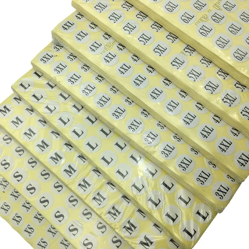 Transparent circular letter-size stickers on yellow backing sheets.