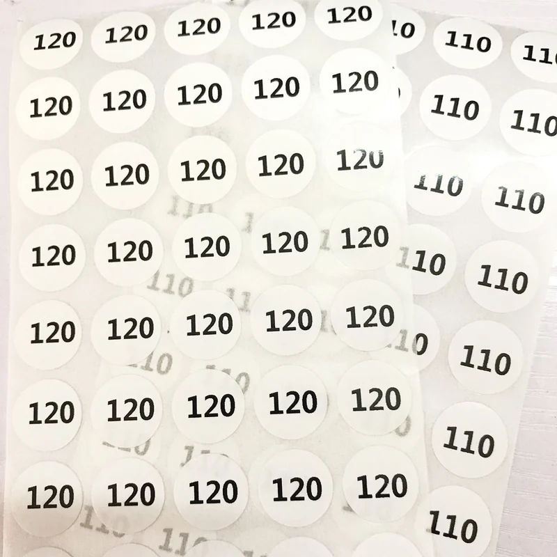 Round size stickers with printed numeric markings.