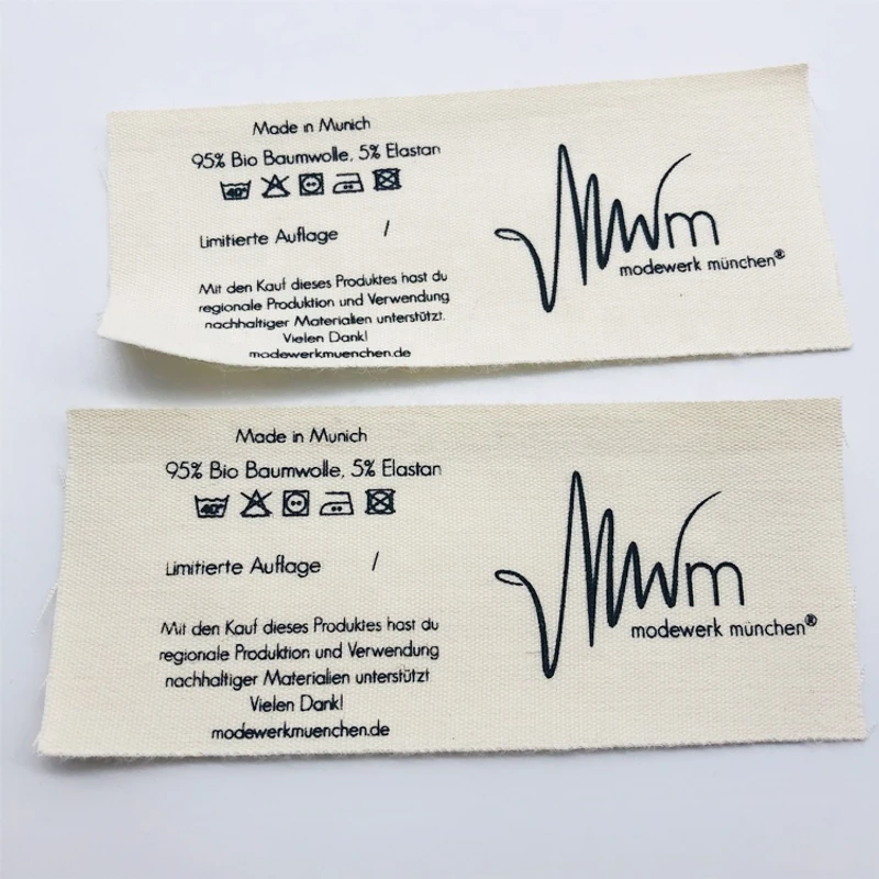 Printed fabric care labels showing garment information.
