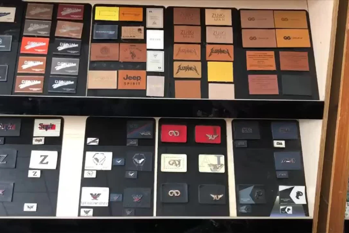 Label samples in several styles arranged on display boards.