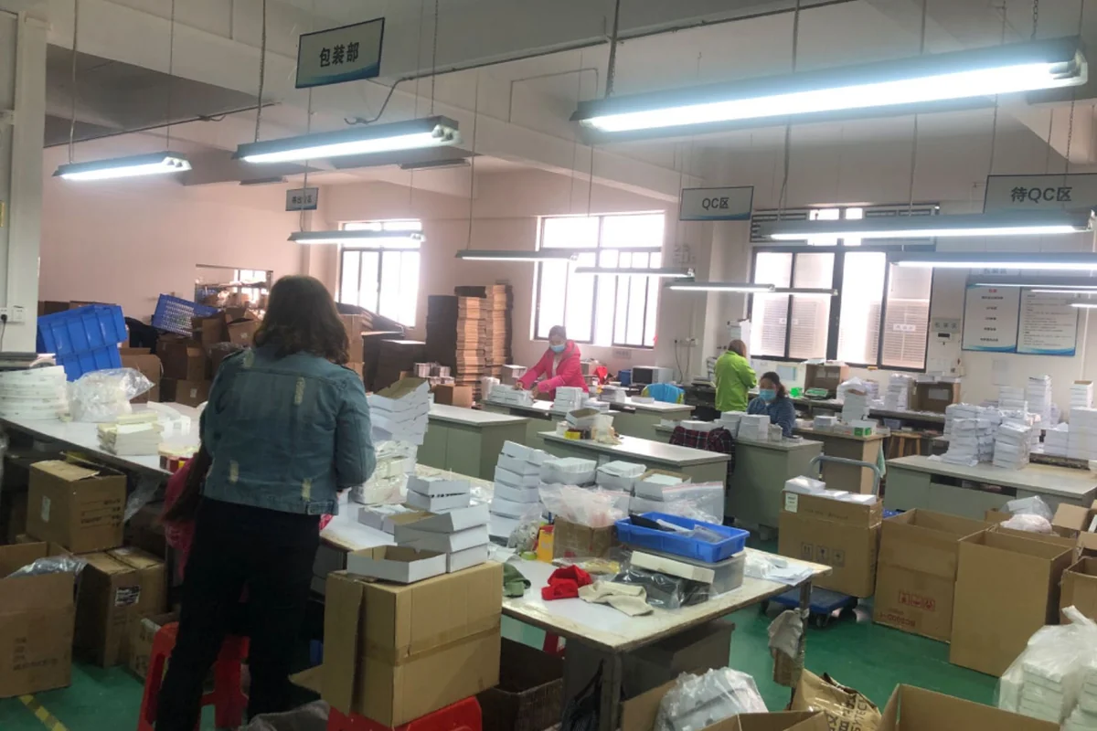 Operators and equipment in a label production area.